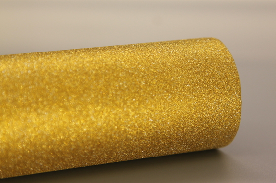 Sıcaklığa 120 dereceye kadar dayanıklılık Glitter Lamination Film Su bazlı yapıştırıcılar Kum gibi altın ışığı olan parlaklar
